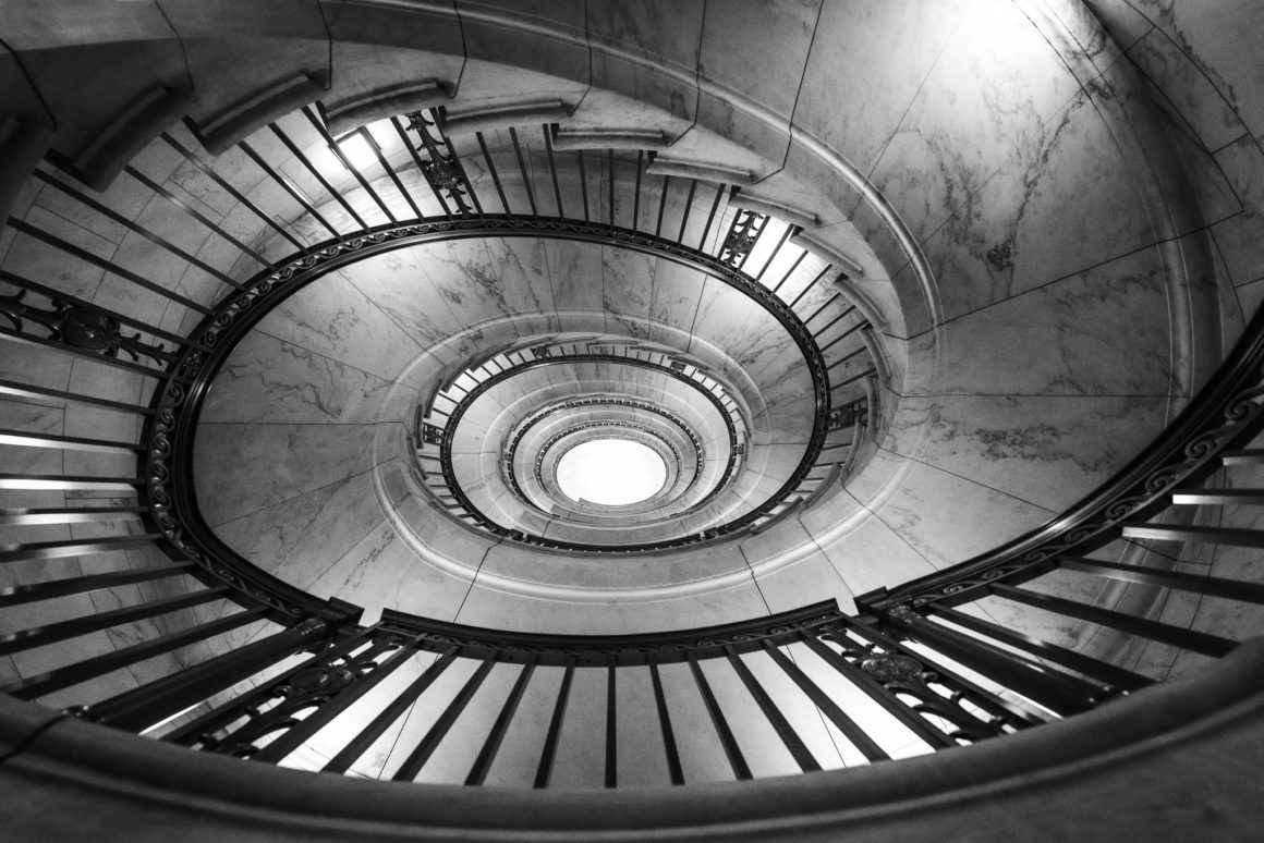black and white image of the spiral staircase at the US supreme court